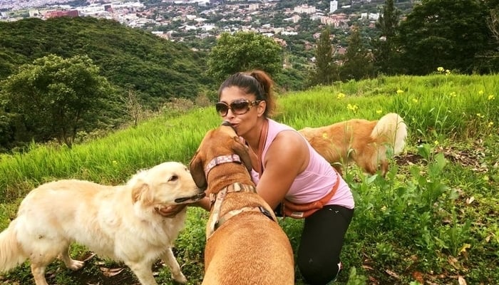 Coronavirus crisis hero Anna Maya Morburg with her dogs in Costa Rica / Anna Maya Moberg Facebook Page