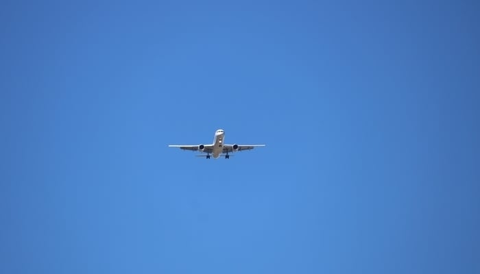 Costa Rica Flight Info: Plane arriving into SJO Airport, Costa Rica / Photo by Josue Isai Ramos Figueroa on Unsplash